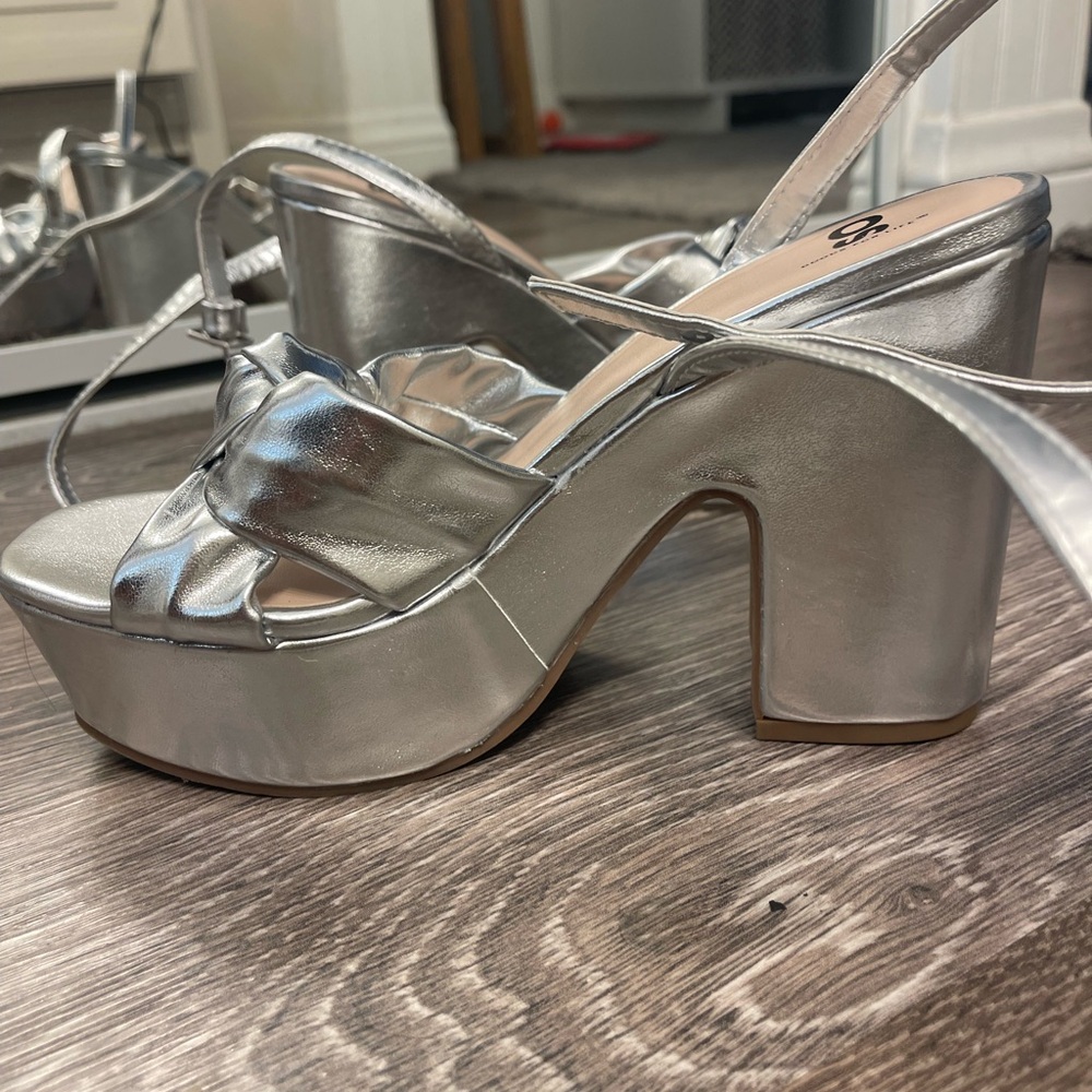 Silver platform heels size 6.5